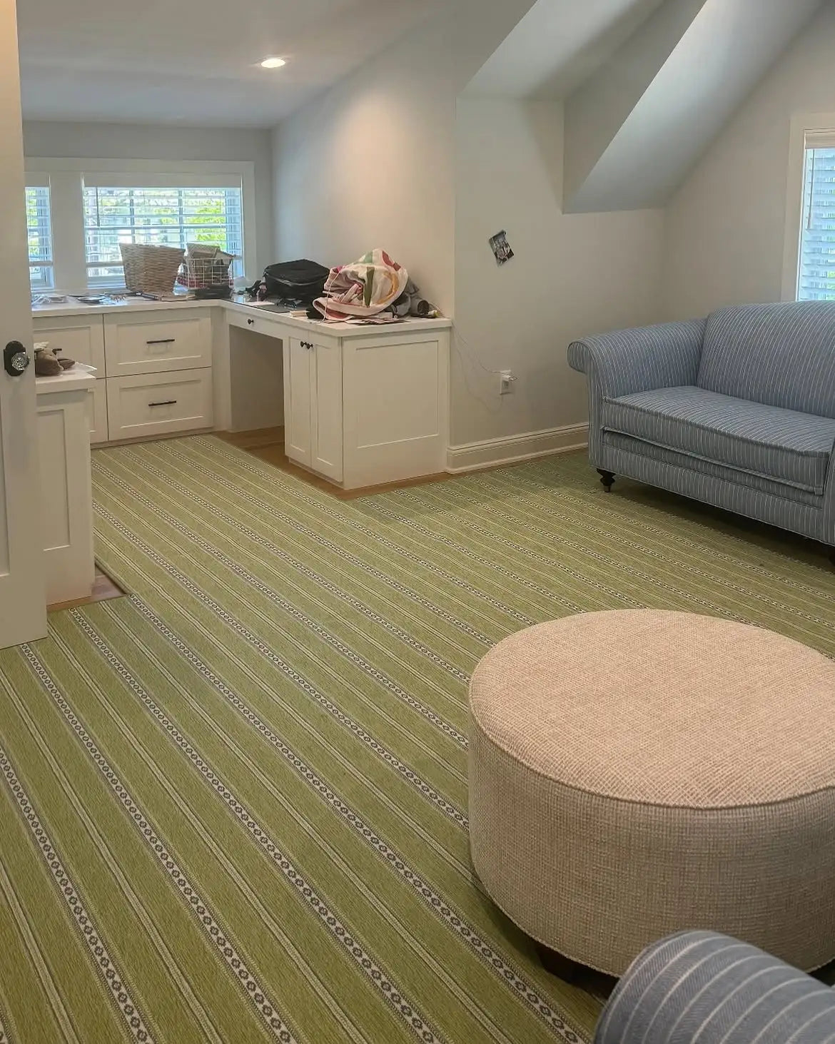 Custom carpet flooring installation in a New York home office with premium striped carpet for comfort and durability.
