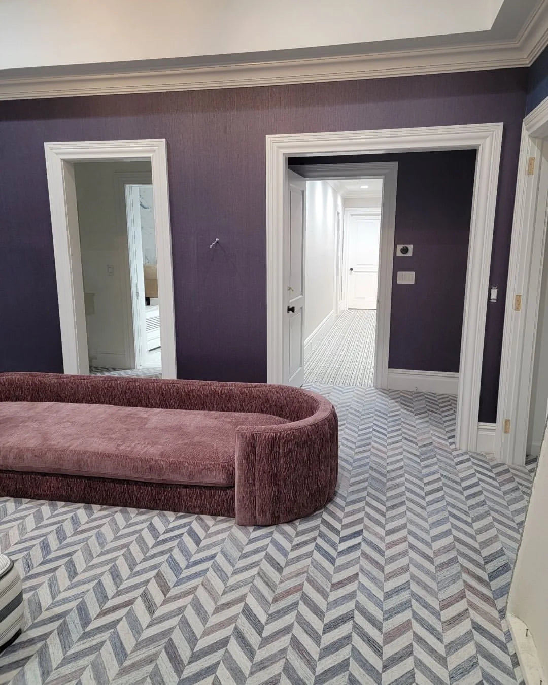 Designer chevron carpet installation in a luxury New York residence showcasing precision wall-to-wall carpet flooring.