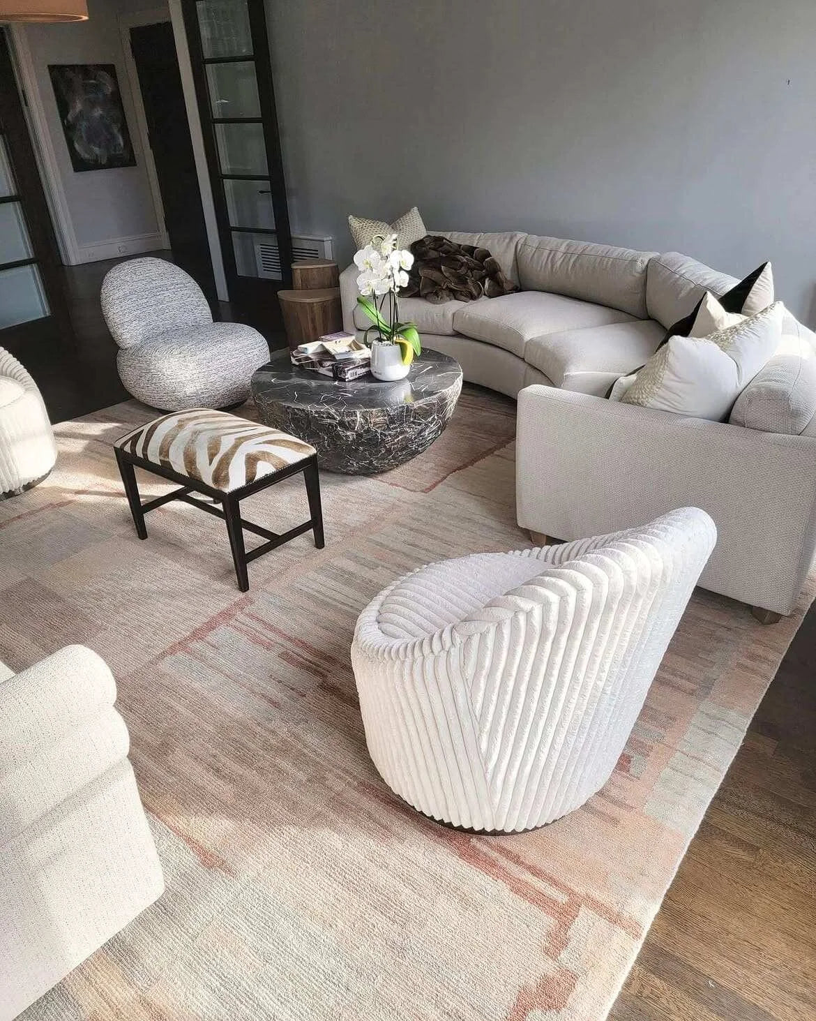 Luxury area rug in a modern living room with neutral furniture