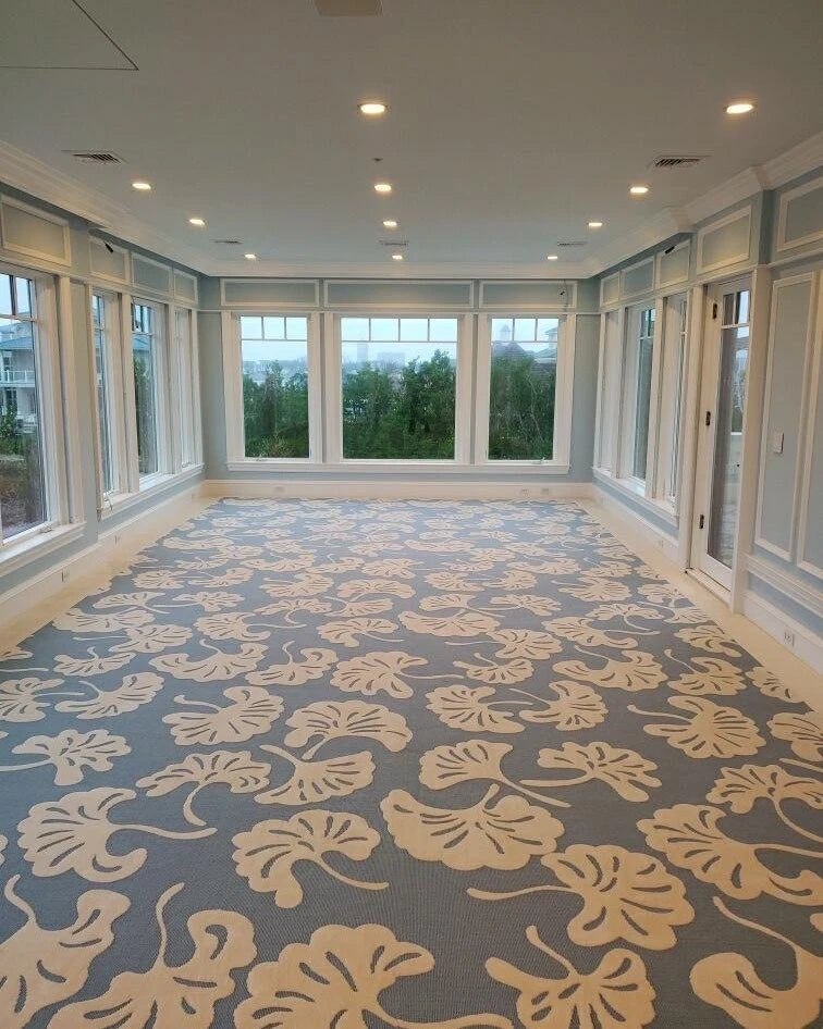 Luxury wall-to-wall carpet installation featuring a custom floral carpet in a spacious New York home