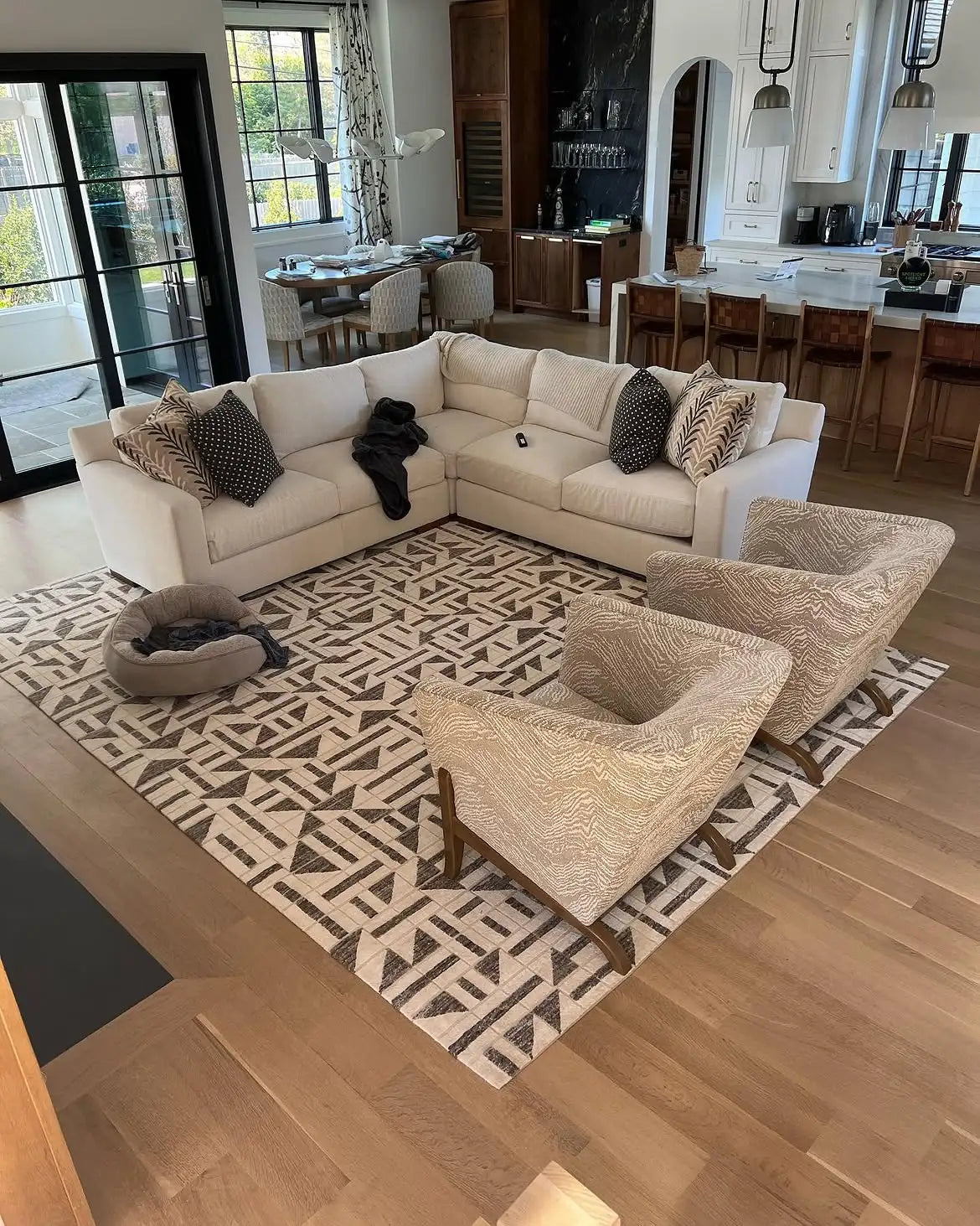 Made-to-order geometric custom area rug paired with modern living room furniture.