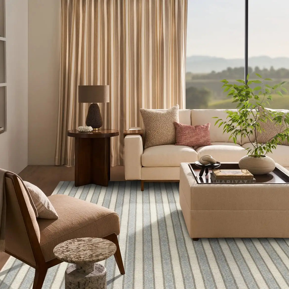 Custom designer area rug styled in a luxury home by Weinstein by STARK